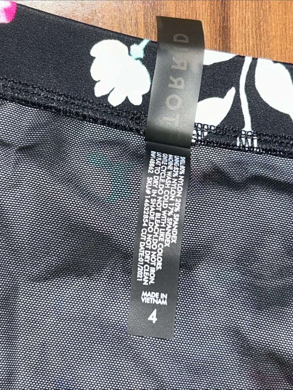 Size 4 Torrid Swim bottoms mini skirt side tie floral
